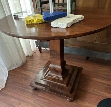 Round antique table.