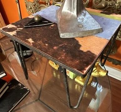 Hide and metal hair clips legs small table.